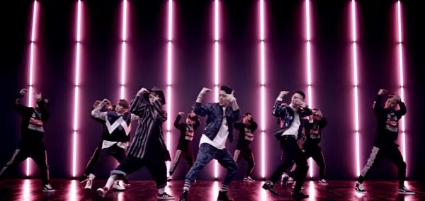 Insoo along with his MYNAME co-members in the music video of their single "Just Tell Me".