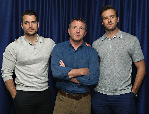Actor Henry Cavill, director Guy Ritchie, and actor Armie Hammer posed for a photo during SiriusXM's Entertainment Weekly Radio “The Man from U.N.C.L.E.” Town Hall with Guy Ritchie, Henry Cavill and Armie Hammer on August 12, 2015 in New York City. 