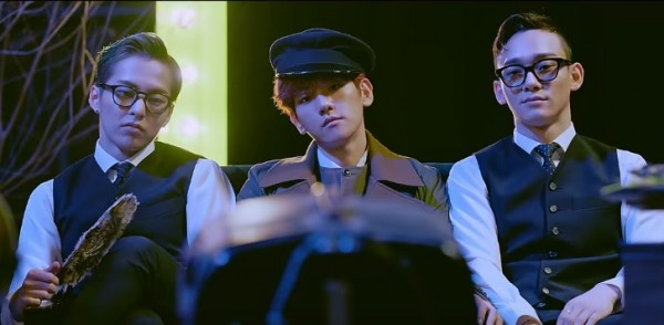 Chen, Baekhyun, and Xiumin of boy group EXO-CBS on the music video of their single 'Hey Mama!'.