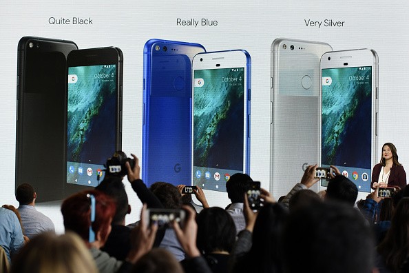 Sabrina Ellis, director of product management for Google Inc., discusses the colorways of Google Pixel smartphone during a Google product launch event in San Francisco, California, U.S., on Tuesday, Oct. 4, 2016. Google is embarking on a wholesale revamp 