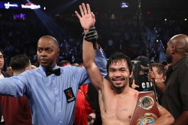 Manny Pacquiao reclaims WBO Welterweight title from Jessie Vargas.