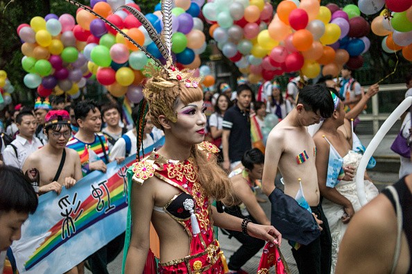 In this photo taken on October 29, 2016, people attend the annual Taiwan lesbian, gay, bisexual and transgender pride parade in Taipei. Thousands of the same-sex activists marched in the streets in front of the Presidential Palace in Taipei calling the pu