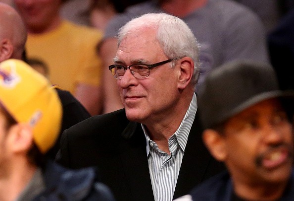 New York Knicks president Phil Jackson watches from the stands as his team plays the Los Angeles Lakers at Staples Center on March 12, 2015 in Los Angeles, California. The Knicks won 101-94.  