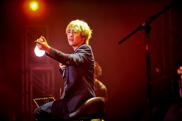 F.T. Island's Hongki performs on stage in concert at AsiaWorld-Expo.