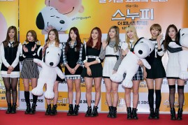 Girl group TWICE attend the photocall for 'The Peanuts Movie' Seoul Premiere at the Lotte Department Store on November 24, 2015 in Seoul, South Korea. The film will open on December 24, in South Korea.