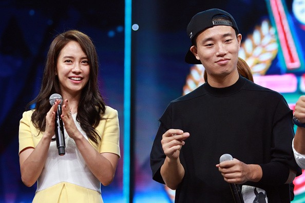 South Korean rapper Gary and South Korean actress Song Ji-hyo attend the shooting of TV program 'Day Day Up' on August 27, 2015 in Changsha, Hunan Province of China.
