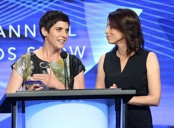 Writers/directors Moira Demos (L) and Laura Ricciardi accept the award for 'Outstanding Achievement in Reality Programming' for 'Making a Murderer' at the 32nd annual Television Critics Association Awards.