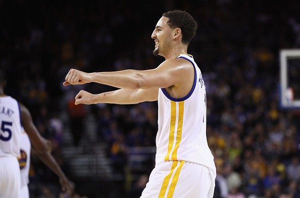 Klay Thompson #11 of the Golden State Warriors reacts during their preseason game against the Los Angeles Clippers at ORACLE Arena on October 4, 2016 in Oakland, California. 