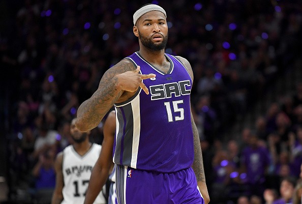 DeMarcus Cousins #15 of the Sacramento Kings reacts after making a three-point shot against the San Antonio Spurs during the third quarter of an NBA basketball game at Golden 1 Center on October 27, 2016 in Sacramento, California.