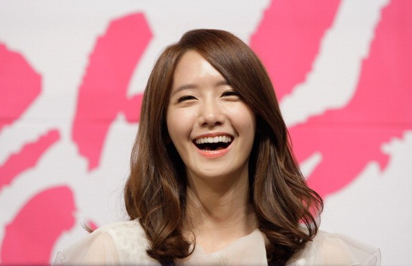 Girls' Generation member YoonA all smile during a press conference for "Love Rain."