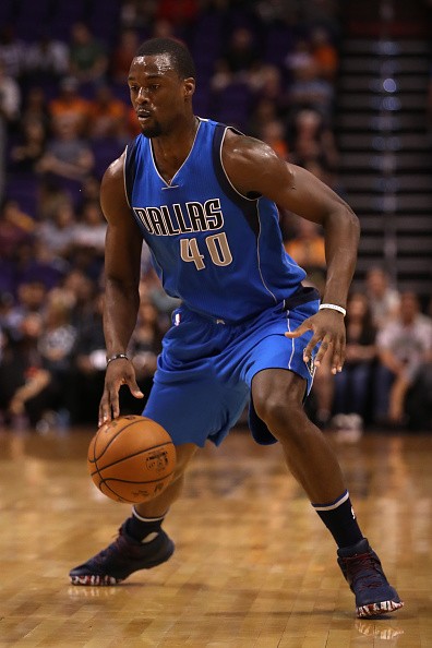 Harrison Barnes #40 of the Dallas Mavericks handles the ball during the first half of the preseason NBA game against the Phoenix Suns at Talking Stick Resort Arena on October 14, 2016 in Phoenix, Arizona 