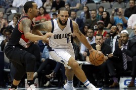 Deron Williams #8 of the Dallas Mavericks dribbles the ball past Shabazz Napier #6 of the Portland Trail Blazers in the second half at American Airlines Center on November 4, 2016 in Dallas, Texas. 