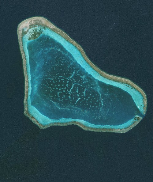 DigitalGlobe overview imagery of Scarborough Shoal in the South China Sea. It is a disputed territory claimed by the People's Republic of China, Republic of China (Taiwan), and the Philippines. 