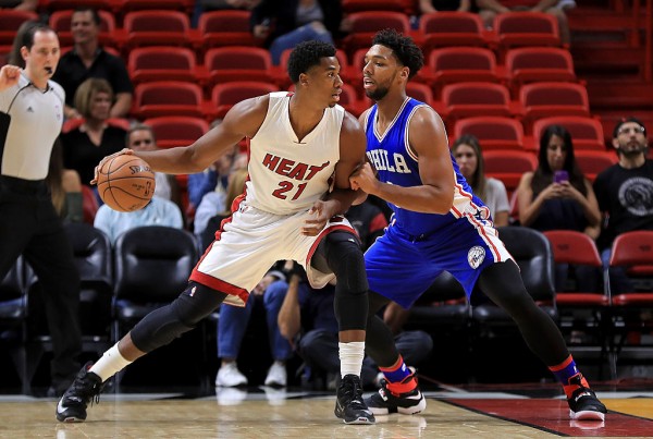 Miami Heat center Hassan Whiteside (L) posts up against Philadelphia 76ers' Jahlil Okafor