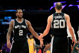 Kawhi Leonard #2 congratulates Manu Ginobili #20 of the San Antonio Spurs after defeating the Los Angeles Lakers 116-107 during a game at Staples Center on November 18, 2016 in Los Angeles, California. 