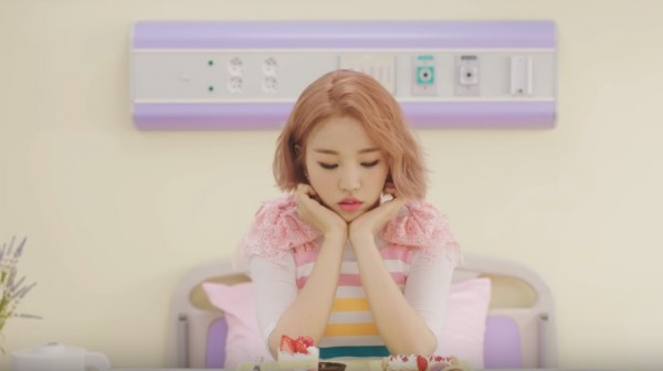 Baek Ah Yeon on the music video of her single “So-So”.