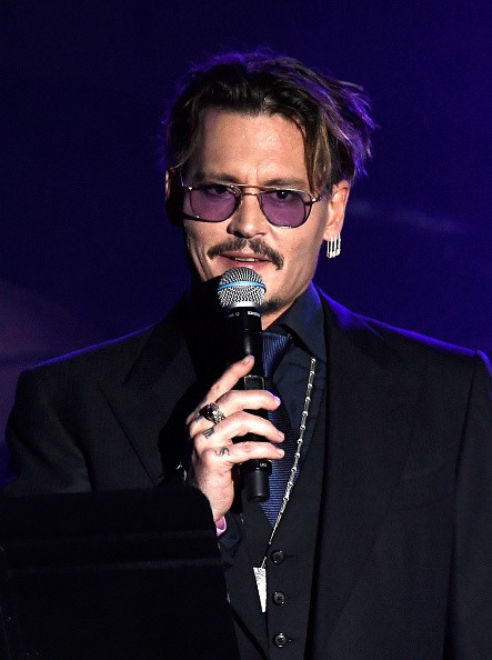 Johnny Depp accepted The Rhonda's Kiss Healing And Hope Award onstage during the 2016 Rhonda's Kiss Benefit at El Rey Theatre on Nov. 3 in Los Angeles, California.
