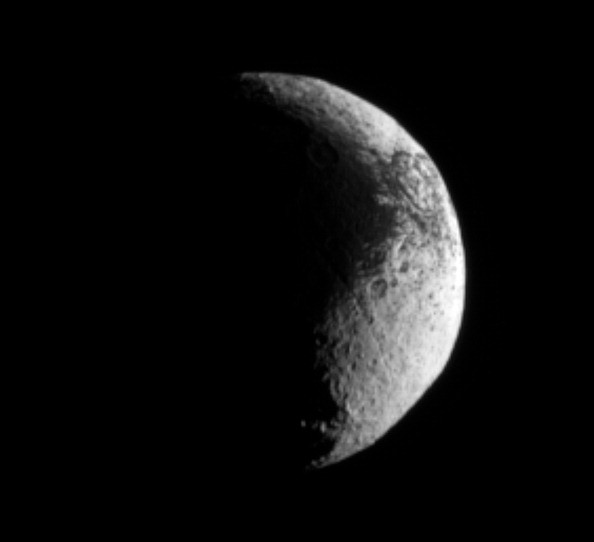 The Cassini spacecraft examines the rough dark-light dichotomy of the terrain on Saturn's moon Iapetus. 