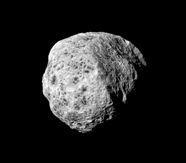 The sponge-like surface of Saturn's moon Hyperion is highlighted in this Cassini portrait.