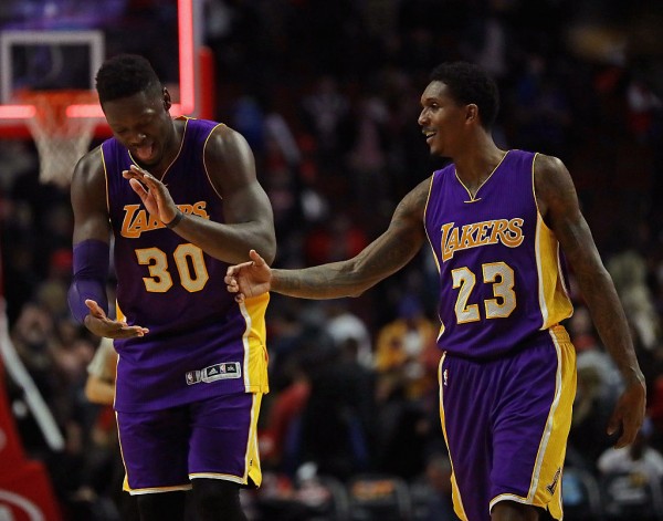 Los Angeles Lakers players Julius Randle (L) and Lou Williams