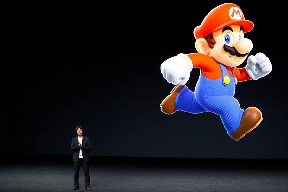 "Super Mario Run" producer Shigeru Miyamoto speaks during an Apple launch event in California.