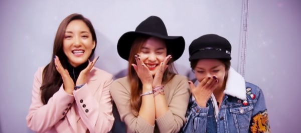 S.E.S. members in the promotion video for their upcoming concert 'Remember, The Day'.