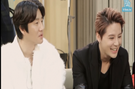 Kim Junsu, sitting on the right, joins Epik High at the backstage for an interview at V Live. 