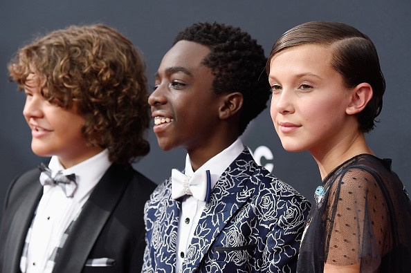 Actors Gaten Matarazzo, Caleb McLaughlin, and Millie Bobby Brown attended the 68th Annual Primetime Emmy Awards at Microsoft Theater on Sept. 18 in Los Angeles, California.