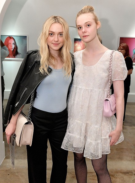 Actors Dakota Fanning and Elle Fanning attended the opening of the Anton Yelchin photography exhibit at Other Gallery on Nov. 5 in Los Angeles, California.