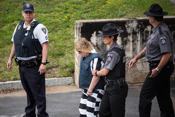 Joyce Mitchell, a prison worker who allegedly helped two convicts escape from prison, was led from Plattsburgh Ciy Court after a hearing on June 15, 2015 in Plattsburgh, New York.