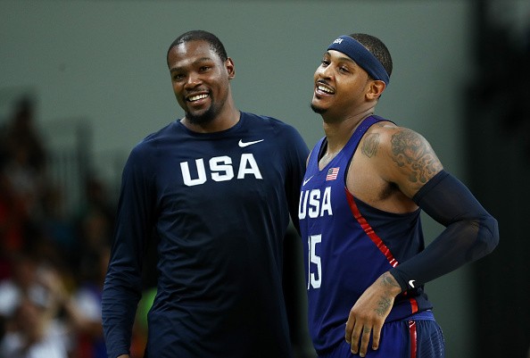 Kevin Durant and Carmelo Anthony #15 of United States celebrates after defeating Serbia during the Men's Gold medal game on Day 16 of the Rio 2016 Olympic Games at Carioca Arena 1 on August 21, 2016 in Rio de Janeiro, Brazil. 