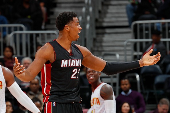 Hassan Whiteside #21 of the Miami Heat reacts after being charged with an offensive foul against the Atlanta Hawks at Philips Arena on December 7, 2016 in Atlanta, Georgia. 