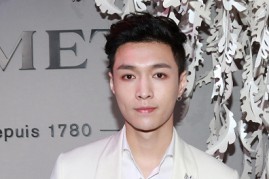  Singer Lay Zhang Yixing of South Korean-Chinese boy group Exo attends Chaumet jewelry show on October 20, 2016 in Beijing, China.