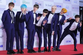 BTS attend the The 25th Seoul Music Awards at Olympic Park on January 14, 2016 in Seoul, South Korea. 