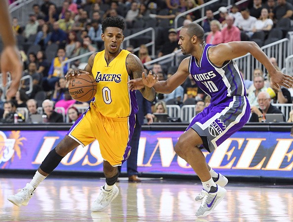 Nick Young #0 of the Los Angeles Lakers drives against Arron Afflalo #40 of the Sacramento Kings during their preseason game at T-Mobile Arena on October 13, 2016 in Las Vegas, Nevada.
