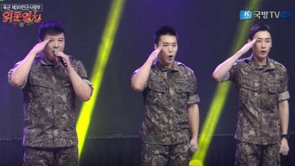 Super Junior's Shindong, Eunhyuk and Sungmin in their military uniform.