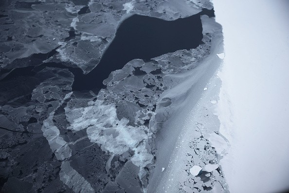 Sea ice floats near the coast of West Antarctica as seen from a window of a NASA Operation IceBridge airplane on October 27, 2016 in-flight over Antarctica.