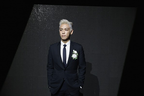 BIGBANG's T.O.P attends the Dior Menswear Fall/Winter 2016/2017 fashion show in Paris.