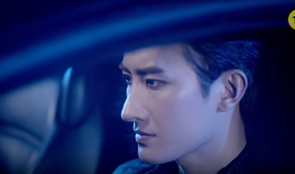 Super Junior-M's Zhoumi in the official music video of "Rewind."