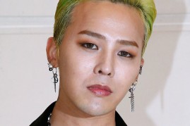 Singer Kwon Ji-Yong alias. G-Dragon attends the 'Chanel Collection des Metiers d'Art 2016/17 : Paris Cosmopolite' : Photocall at Hotel Ritz on December 6, 2016 in Paris, France.