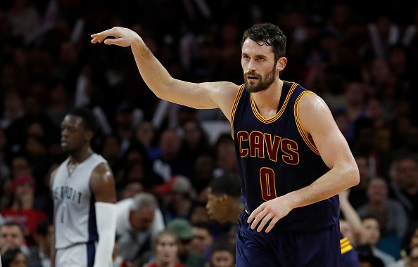 Kevin Love #0 of the Cleveland Cavaliers reacts after making a first half shot against the Detroit Pistons at the Palace of Auburn Hills on December 26, 2016 in Auburn Hills, Michigan.  