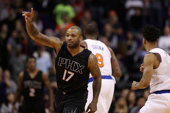 P.J. Tucker #17 of the Phoenix Suns reacts during overtime of the NBA game against the New York Knicks at Talking Stick Resort Arena on December 13, 2016 in Phoenix, Arizona.