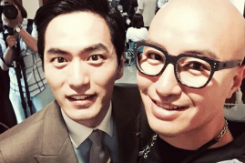 Lee Jin-Wook poses for a photo with openly gay South Korean actor and restaurateur Hong Seok-cheon on the set of 