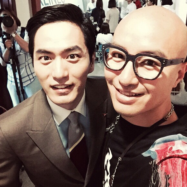 Lee Jin-Wook poses for a photo with openly gay South Korean actor and restaurateur Hong Seok-cheon on the set of "The Time We Were Not in Love."
