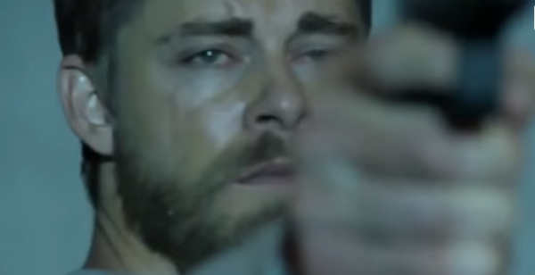 A photo of Luke Mitchell as Roman in a scene taken from "Blindspot" Season 2.