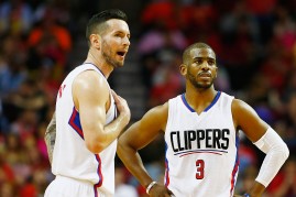 Los Angeles Clippers players JJ Redick (L) and Chris Paul