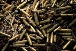 Seen are spent ammunition bullet casings laying on the ground during a live fire excercise on July 31, 2013 near Rockhampton, Australia.