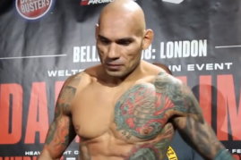 Evangelista 'Cyborg' Santos weighs in before his face-off with Michael 'Venom' Page in Bellator 158