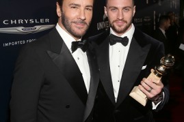 Director Tom Ford (L) and actor Aaron Taylor-Johnson, winner of Best Supporting Actor in a Motion Picture for 'Nocturnal Animals'.