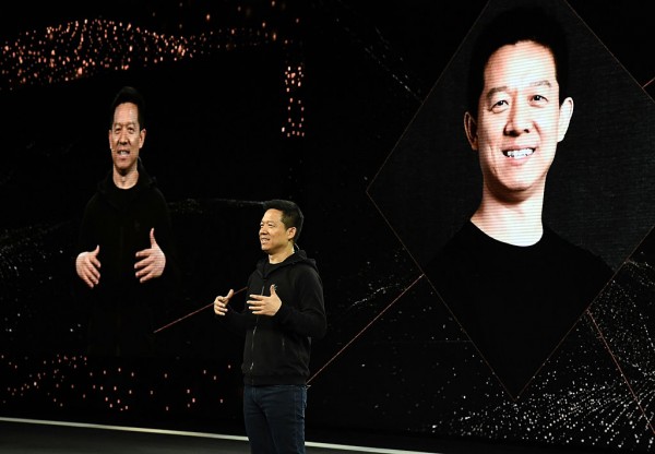 LeEco Founder and CEO YT Jia unveils Faraday Future's FF 91 prototype electric crossover vehicle during a press event for CES 2017.